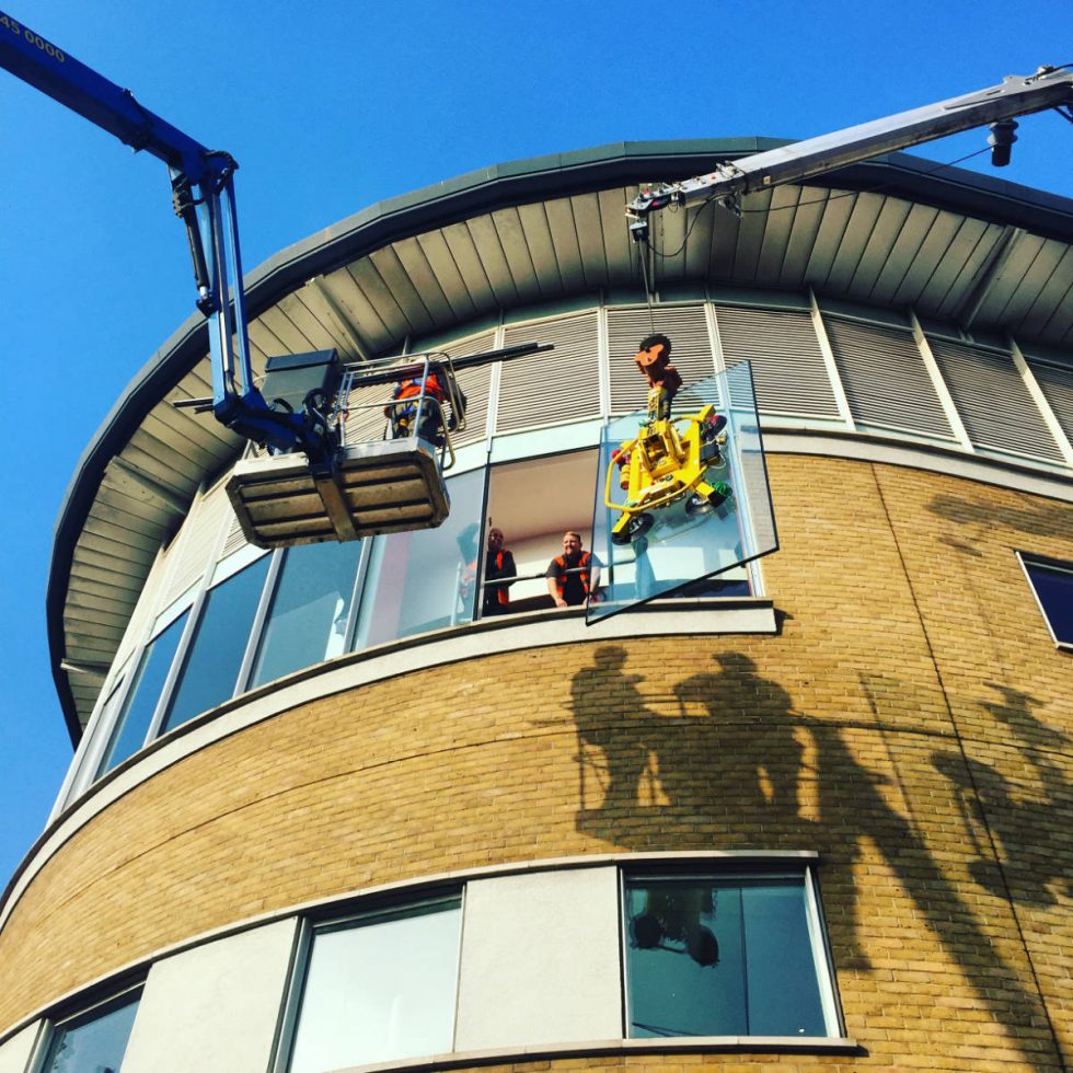 installing window on high level curved building