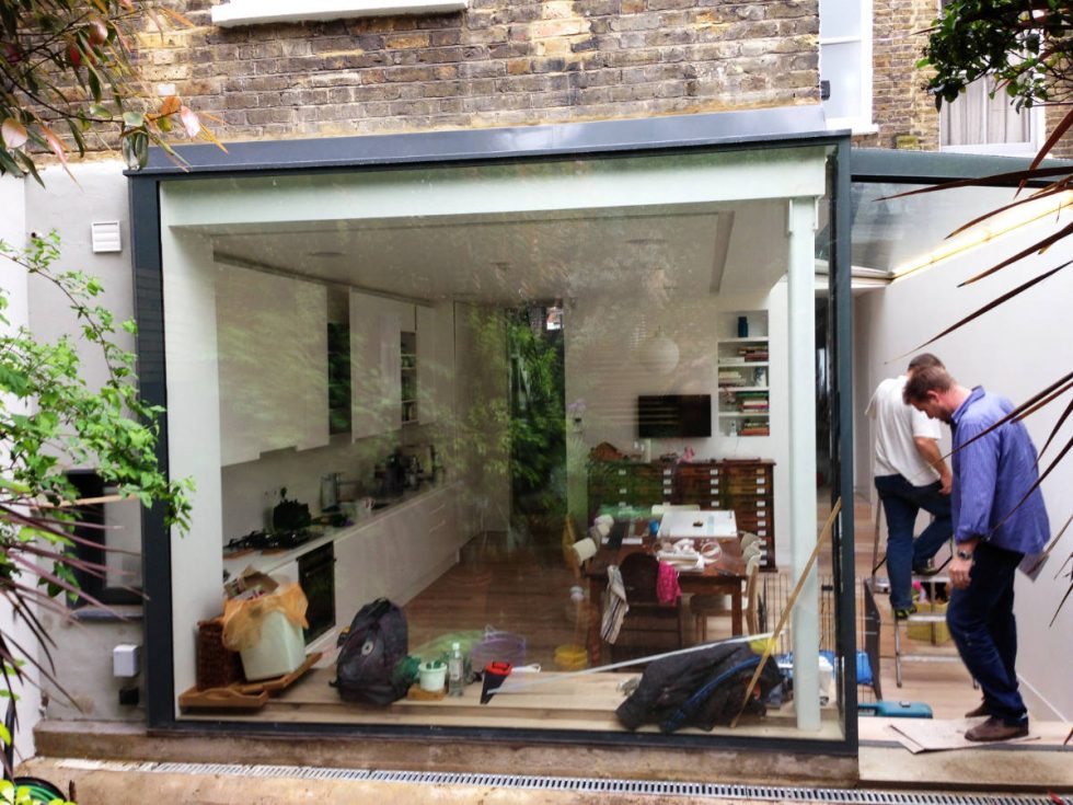 huge glass window with view of kitchen